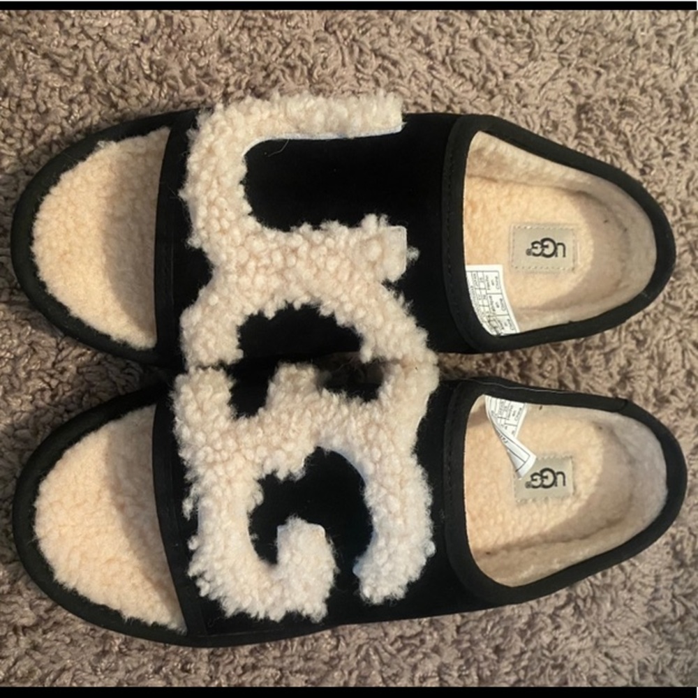 Black Ugg slippers. Worn once, inside.
